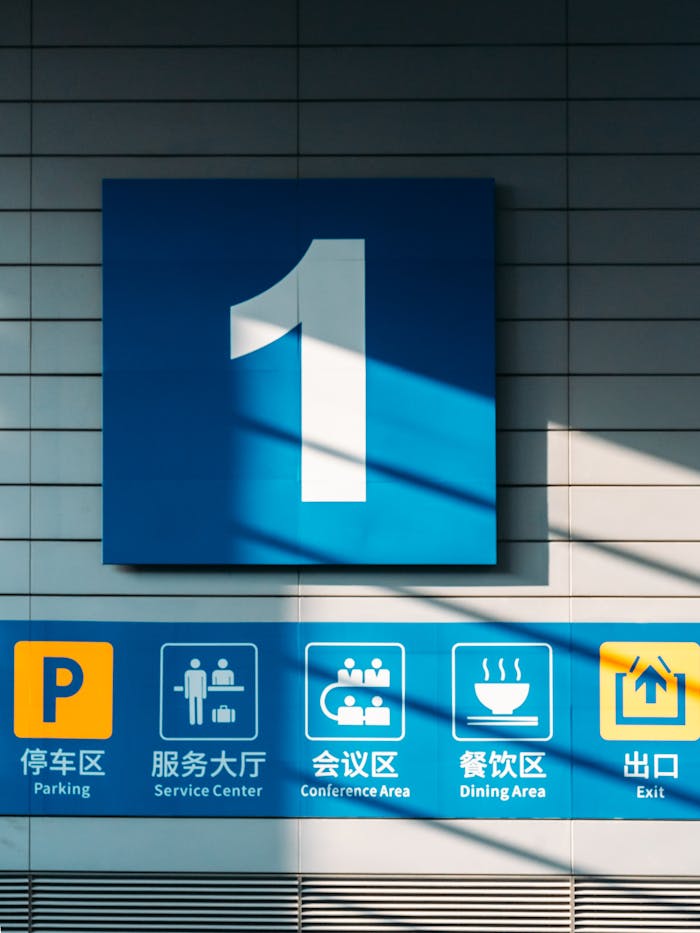 Blue and yellow signage featuring the number one and service icons, creating a modern look.